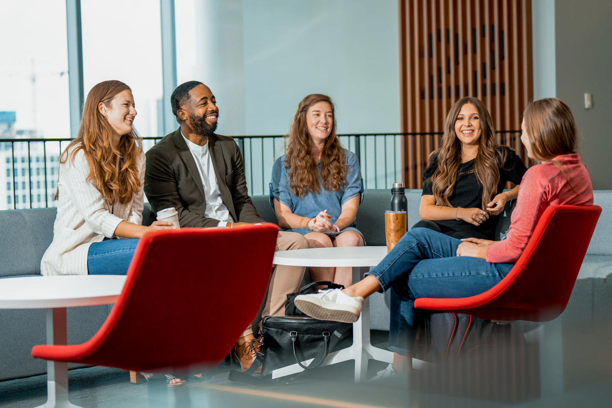 a group of people sitting in a circle